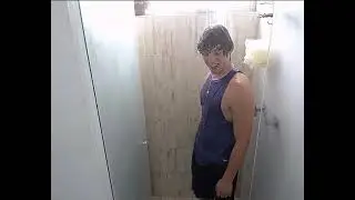Wet guy in purple tanktop