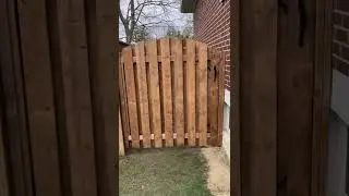 Arched shadow box gate.