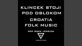 klincek stoji pod oblokom