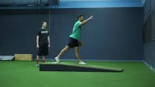 Split Stance Forward Facing Throw with Step Back on Mound