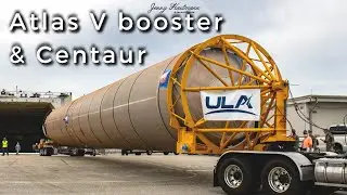 Atlas V booster and dual engine Centaur upper stage roll out of ULA'S Rocketship