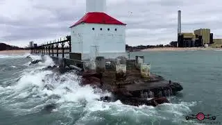 Winter tour around Michigan City Lighthouse and break wall Flying in Winter Storms 6K Drone Footage