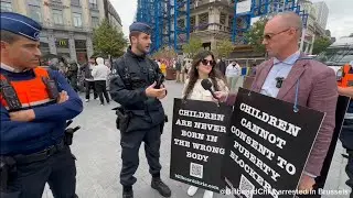 Arrested, handcuffed, strip-searched, and JAILED in Brussels.