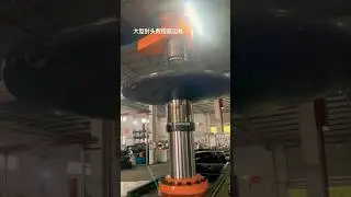 Dish end spinning flanging machine