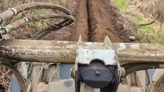 Digging a trench for the water line to the camper with 753 Bobcat and trencher.