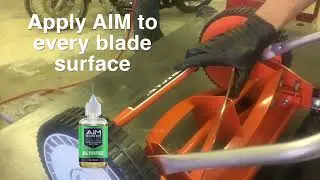 How to lubricate blades on a manual push lawnmower using AIM Extreme