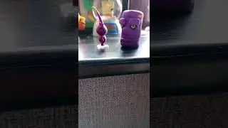 Pillar John is destroyed by purple pikmin.