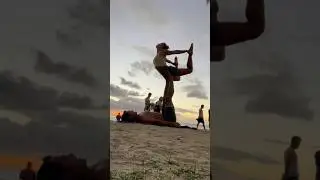 Acro yoga flow at sunset