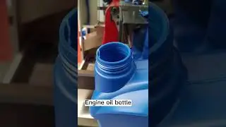 Engine oil bottle blow molding machine