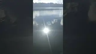 🔵Sun's reflection on slack sea water