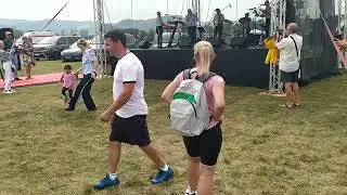 us air force member dancing with litlle girl, air show SIAF, Slovakia