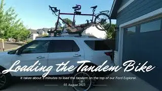 Loading Tandem on Yakima Sidewinder Roof Rack