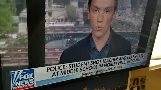 Indiana school teacher stops shooter