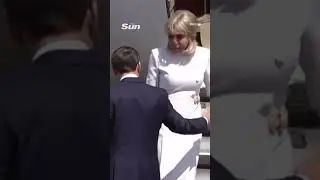 Moment Brigitte Macron 'rejects' husband's help leaving plane after viral slap vid