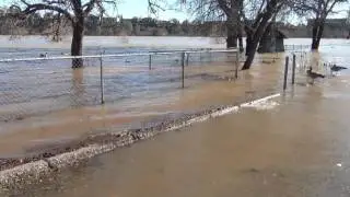Water from the Sacramento River flows up to Park Marina Drive in Redding, California