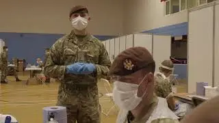 Military Personnel in Liverpool Show How Pilot Mass COVID Testing Works