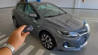 detalhes novo Chevrolet onix premier 2 cinza satin steel 2023 hatch 116cv turbo automático