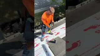Roofing around a pipe boot