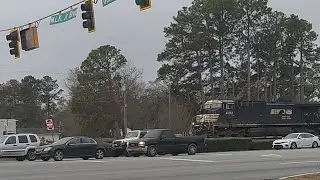 NS 4182 leads a southbound manifest towards Unadilla, Georgia.