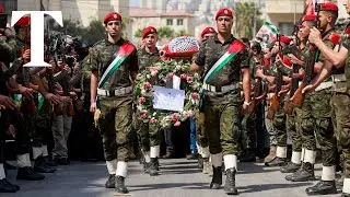 Mourners attend West Bank funeral procession for US citizen