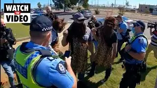 Scott Morrison's press conference invaded by cavemen