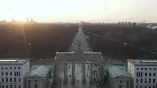AERIAL: Over 17th of June Street and Tiergarten with Berlin Victory Column revealing Brandenburg