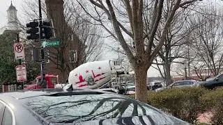 Frederick Douglass on concrete mixer in Washington, DC on Georgia Avenue NW