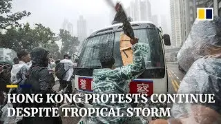 Hong Kong protests continue despite tropical storm