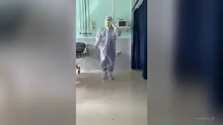 A doctor dancing wearing a PPE kit is the only positive vibe you need right now