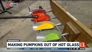 Making pumpkins out of hot glass