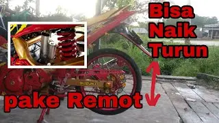 Cara bikin ban belakang bisa naik turun...seperti air suspension.