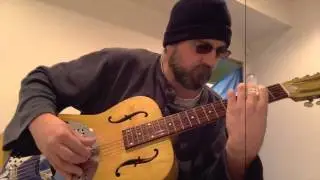 David Christensen,. Dobro Dog lays down a new composition