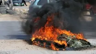Libya: fatal Benghazi clashes between protesters and militia