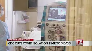 CDC cuts COVID isolation time in half