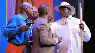Teacher Mpamire Acting Ugandan President Museveni.(Uganda Airlines)