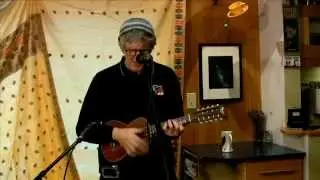 Peter Tigchelaar, Messenger Running, playing a 10 string Tiple ukulele.
