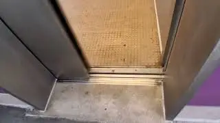 Otis Series 5 hydraulic parking glass elevator at the Cross County mall (Yonkers, NY)