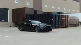 Roaring Elegance: 2012 Black Shelby GT500 Mustang in Action!