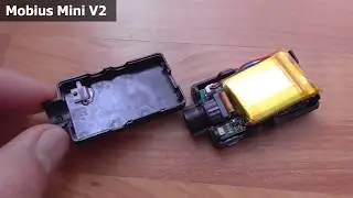 Mobius Mini camera taken apart (enlarge Reset button opening)