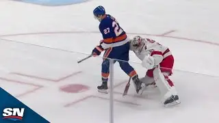 Islanders' Anders Lee, Hurricanes' Pyotr Kochetkov Collide On Race To The Puck