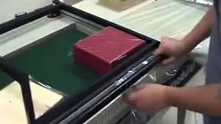 Soudeuse/scelleuse en L semi-automatique avec fermeture manuelle Ecomodular et Tunnel de r&eacute;traction
