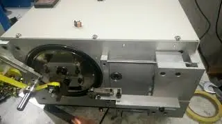 Coil tapping machine