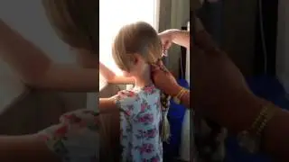Luiza cortando o cabelo para doação, hospital do câncer bh
