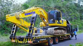 Excavator Trucking Delivery To The Limestone Construction Site