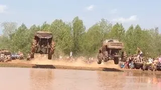 SIDE BY SIDE MEGA TRUCK DAM JUMP!