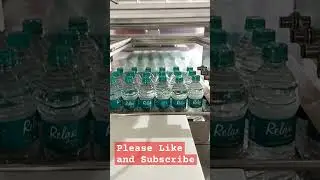 Shrink wrapping machine for water bottle #shrinkwrap