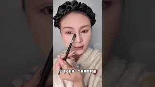 A round and square face has been transformed into a perfect New Year makeup look The god w