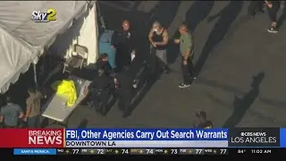 FBI, LAPD and others carry out dozens of search warrants in gang sweep