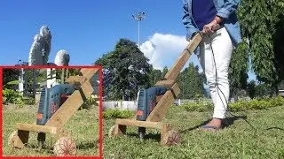 How to make a lawn mover/grass cutter from a drill machine .