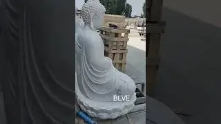 white marble Buddha statue sitting